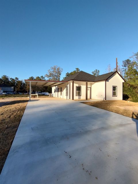 Photo of 420 Jordan Road, Rose Hill Acres, TX 77657 (MLS # 264778)