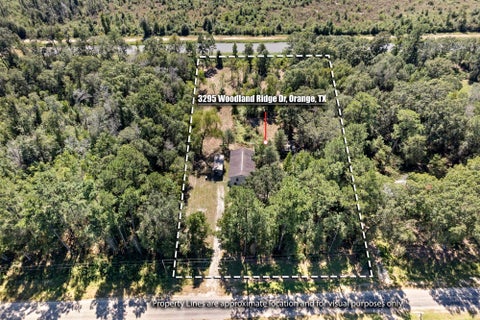 Photo of 3295 Woodland Ridge Dr, Orange, TX 77632 (MLS # 271849)