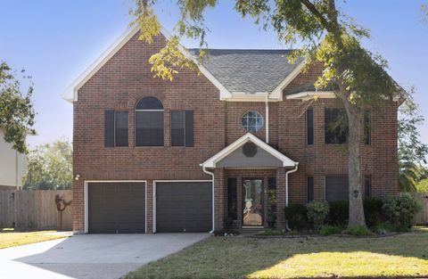 Photo of 1015 Highland Woods Dr, Baytown, TX 77562 (MLS # 263600)