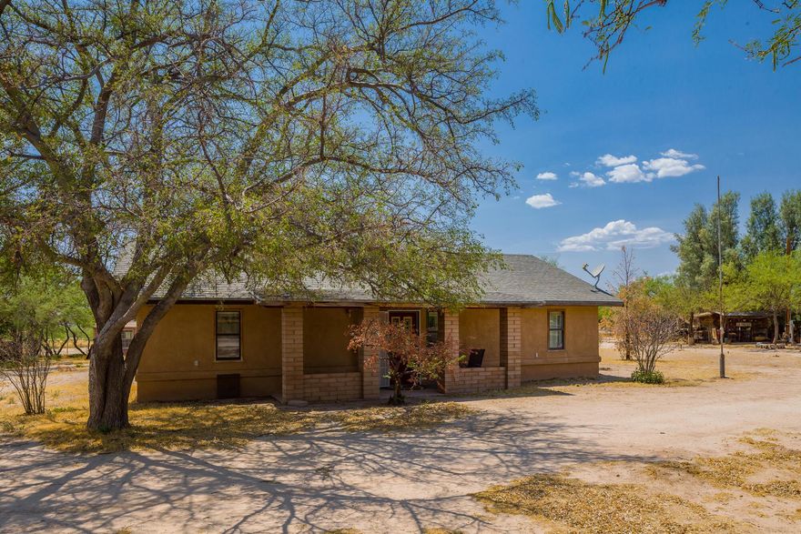 This unique property is awaiting a new family  with a love of the old west. Well maintained 2 bedroom 2 bathroom home on just under 6 Acres! This spacious property has a guest house with 1 bed and 1 full bath, 3 Storage buildings, a cantina for entertaining, a custom pit BBQ,  and livestock facilities. The home is on city water and there is also a private well for irrigation. The lot is fully fenced with a gated entrance. Property is being sold as is furnishings and equipment convey. Call to schedule a showing today!