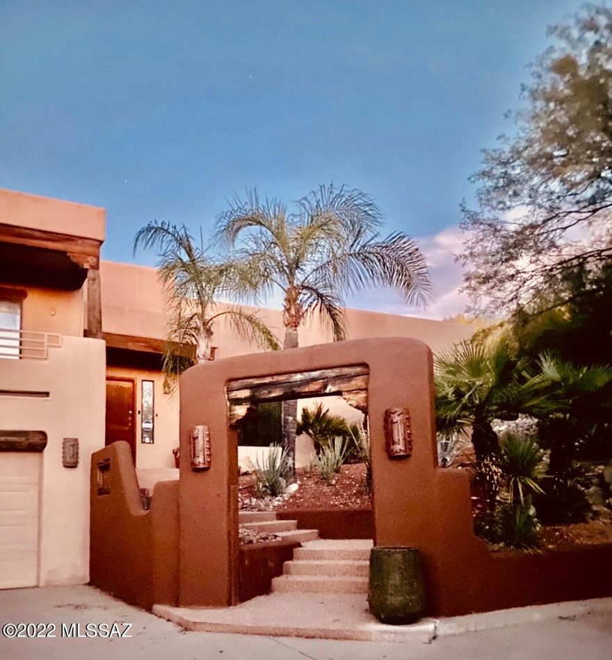 Great opportunity to live in one of the best areas of Tucson, the Catalina Foothills. This gorgeous split-level boasts fantastic views of the city, Arizona sunsets, and a backyard desert oasis with picturesque Sedona red rocks. Privacy galore in a resort style home with a brand-new pebble-tec, 2021, pool  with the backyard hillside as a backdrop.
The master bedroom opens onto a jacuzzi and a private patio to cross over a Japanese redwood bridge for a retreat to a private hammock reading nook. The fun backyard with a large, covered patio is perfect for entertainment and the multiple level seating areas provide unique places to unwind and enjoy the desert wildlife. The master bedroom... features exquisite views everywhere with a picture window alcove tub to soak and relax in, a large walk-through shower, and a great walk-in closet. The large bedrooms are private from the main living area. 
Once inside walk into a dazzling beamed foyer that opens up to an 18 foot high ceiling great room with large picture windows, a private formal dining room, a cozy breakfast nook, and brand new concrete flooring...all overlooking the unbelievable fabulous backyard. The newly redecorated kitchen has lovely new kitchen cabinets, refrigerator, and beautiful granite countertops. 
Another large family room is perfect for TV viewing, pool, exercising, or a large office with a private balcony.  
It's a perfect home for enjoying life!

Close to some of the finest schools in Tucson: 
Basis Tucson North, The Gregory School, and open enrollment for district 16. Whole Foods, a public library, and fine restaurants and shopping are a few blocks away. Some of the Tucson's superb golf courses and gourmet restaurants are in short proximity.
Furnishings available on a separate Bill of Sale.
This property is being sold AS-IS. Water Heater, refrigerator new in 2021. Spa pump new 2022