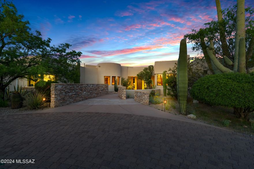Amazing Sonoran Desert Views!! You cannot miss this. An architectural gem, designed by renowned Artchitect; Kevin Howard and high-end designer Lori Caroll crafted this  oustanding luxury home in the pristine desert at the foot of the Rincons Expansive kitchen features granite counters, huge island, double ovens, gas cooktop, wine fridge, beautiful alder cabinetry & more. Owner's suite provides total privacy w/a large walk-in closet & resort-style bath. A dream office & an inviting patio with statement fireplace, pool/spa, grill/bar & covered seating. Amazing 2BR/2BA attached casita with private entrances, & kitchenette. Minutes away from Tucson's amenities & National Forest on 3.72 acres of horse property. Wheelchair Accessible.  3rd bay garage has a mini split & is being used as an offic