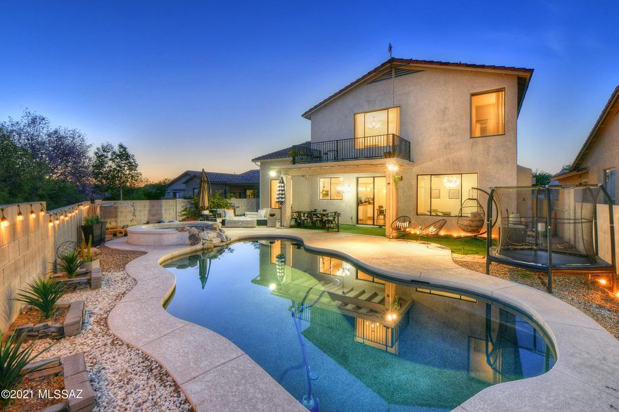 Seller to entertain/counter offers from $500k-$550k. Brimming with style and unobstructed mountain views, this inviting home in gated Monterey at Vistoso backs to open space for pictureperfect views and privacy. PebbleTec pool + spa with waterfall and a covered patio invite you to sit back, relax, and enjoy the outdoors! Inside, stylish updates complement a thoughtful design with formal living and dining spaces, and a welcoming family room with fireplace. Open, lightfilled island kitchen is highlighted by crisp white cabinetry and granite counters. Convenient main level full bath, guest bedroom, and roomy laundry with sink and storage. Upstairs, three additional bedrooms and a sprawling owner's suite with oversized window framing gorgeous mountain views! Bonus Nest smart thermostats.