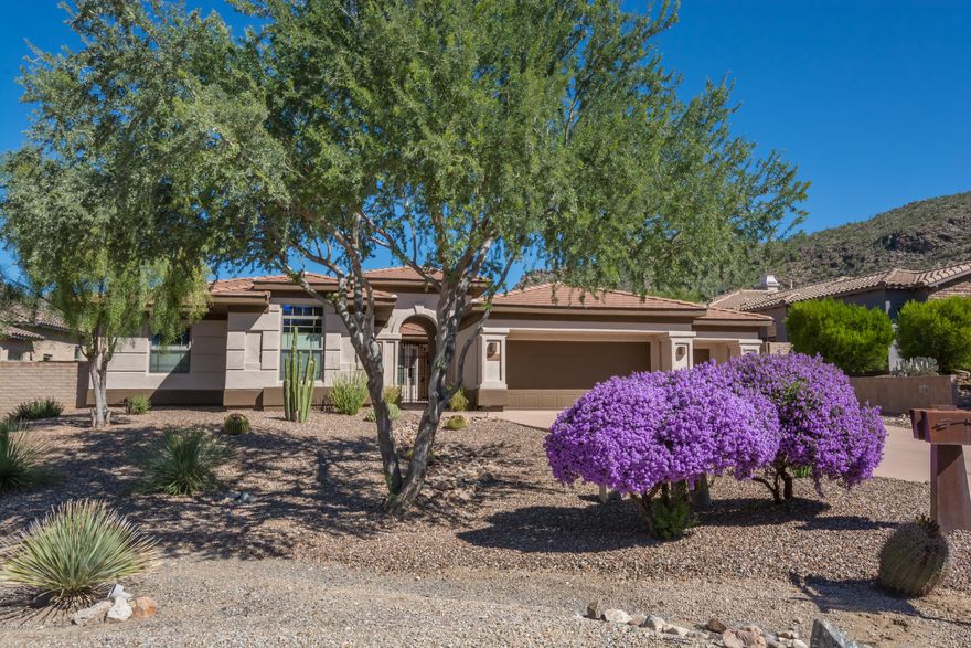 This luxurious contemporary home with lovely Tortolita mtn views boasts fine appointments thruout that will surely delight the most discriminating buyer. Fabulous outdoor living w/sparkling salt water pool & spa, extended cov'd patio, blt-in BBQ & firepit. Inside has high coffered ceils, spacious island kitchen w/brand new blt-in GE Cafe' refrigerator + other Dacor SS appl incl 2 ovens+MW/convection combo, 5-burner cktp, granite cntrs, warming drawer, blt-in desk & bkfast nook. The lavish Mstr Ste incl jetted tub, dbl sinks, sep shower & huge closet. Wonderful greatroom w/FP, tons of light, views & a wet bar w/wine fridge. The gst wing has private sitting area w/2 bdrms & baths. Addl bdrm w/ensuite bath & stunning ofc/den. New paint inside & out. Slr is licensed to sell real estate in AZ