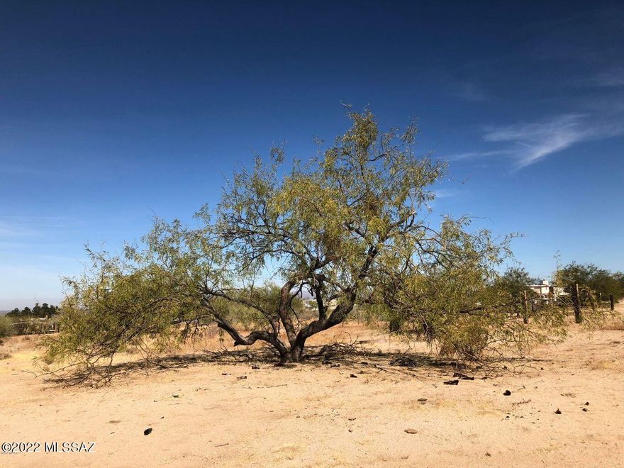 This lot has all utilities available! Well, septic, electric, ready for building in this rural area. Shorter dirt road to the subject parcel and beautiful views.