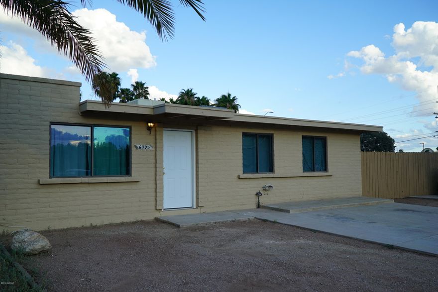 Range priced 145k to 150K to fit buyer's needs. LARGEST LOT IN THE SUBDIVISION! This 3 bedroom 2 bath townhome has an unusually large yard for this complex. The seller has painted the inside and out, put new carpet in the bedrooms, and some new LED light fixtures and fans. Large shed in backyard for storage. Property comes with all appliances, Fridge, washer, dryer, & dishwasher. Home has transferrable warranty through 2/23/2020. AC Works Great! Roof was recoated Sept. 2019. Convenient to DMAFB and shopping! Come get this beauty before it's gone. NO HOA! Makes a great rental also.  Home Qualifies for 10% of the down payment through Pathway to Purchase Financing. Inquire with Listing Agent for details.