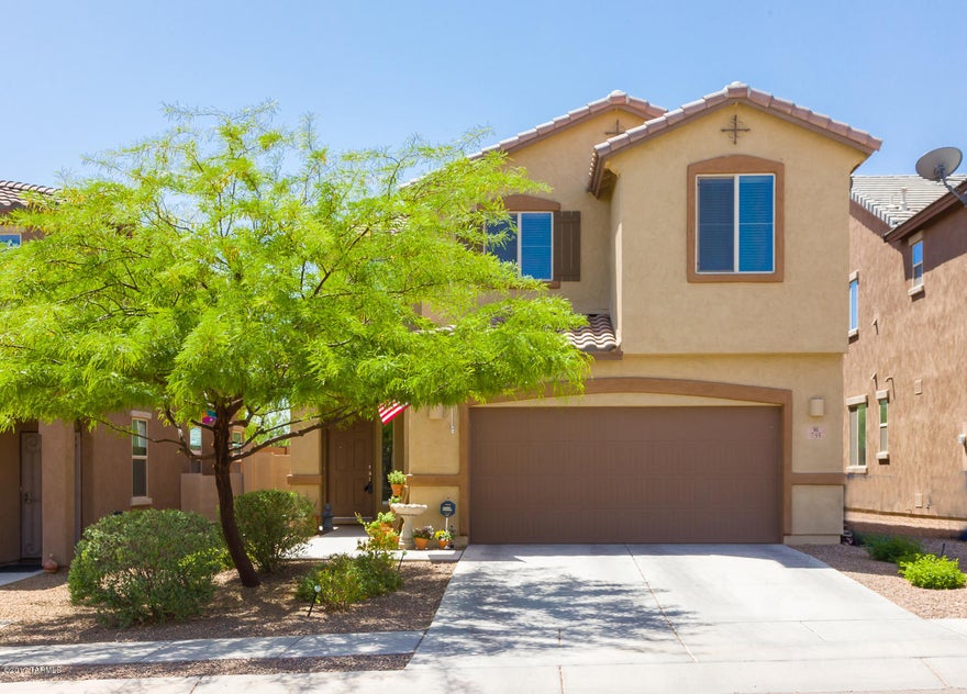 One of Richmond American's most popular floor plans located in a prime spot in Rancho Sahuarita. Just down the street from the community pool.  No neighbors behind the house, fully landscaped back yard with artificial turf, custom brick pavers and so much more. From the moment you walk through the front door, you will be greeted with a wide open floor plan that opens to a luxurious kitchen complete with island, pendant lights & tons of storage. There is a den/office, potential extra room down stairs as well. Upstairs, you will find a super sized loft, large master bedroom bathroom combination that includes a very large walk in closet, walk in shower, dual sinks and pantry. Two more bedrooms, a guest bedroom and the laundry room complete the upstairs.