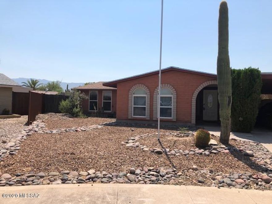On a quiet cul-de-sac is this 4 bedroom home facing N/S with mountain views. Open kitchen with large island, Oak cabinets and black appliances Canned lights thru-out most of home. In rear is a approx 20x12 side covered patio, large storage shed, 2 fruit trees, small stream with pond. Previous owners had chickens (approx 9) in coup on side of house with a grape arbor. Fire pit where pool used to be. At front of house  a nice basket ball hoop and flag pole.