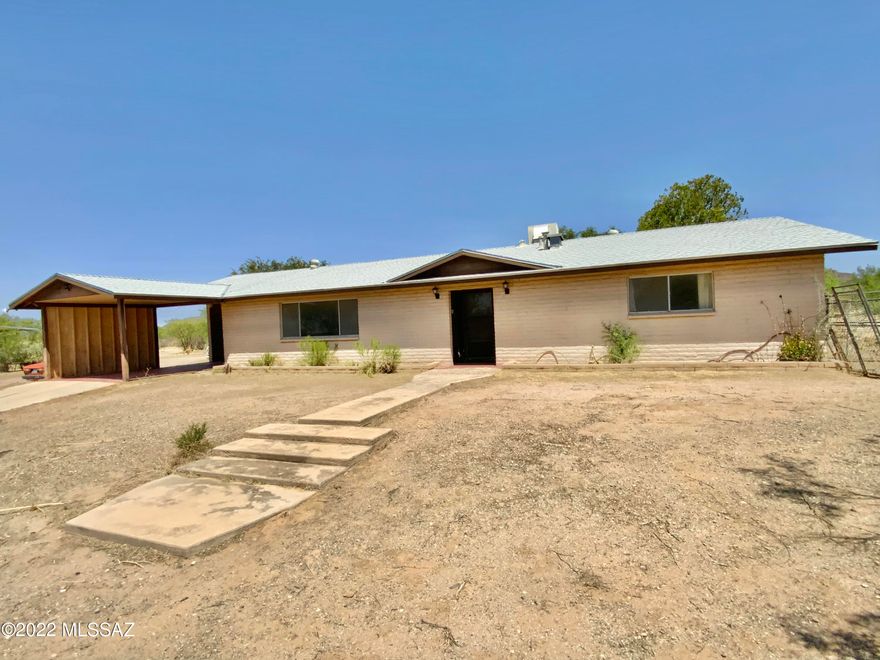 Total fix up/gut! 2096 ft.² Slump block home. 3bed-2bath w/ AZ room. Detached 3 car garage w/ shop area 1758 ft.². All on 3.64 acres horse property w/ private registered water well & views for days. GR-1 zoning allows 1 dwelling per acre. Sewer options off of Irvington.