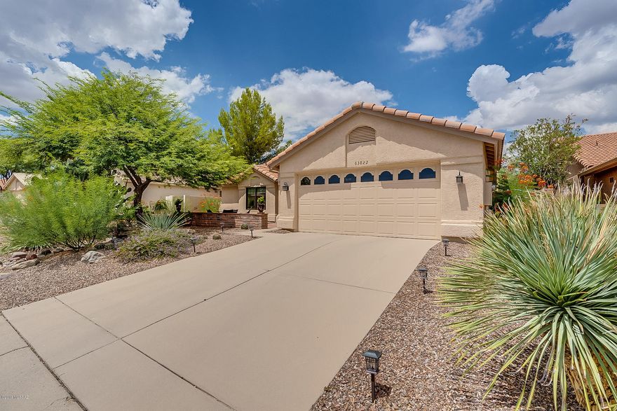 Live the good life in this upgraded 2Bedroom/2Bath Sonoran Model home. Home features vaulted ceilings, great room layout, granite kitchen countertops, Stain steel Appliances, new HVAC, upgraded Anderson Windows on front and Sliding Door, ceiling fans, master bedroom walk-in closet, pull outs in cabinets, and 2 car garage with storage cabinets. The private large backyard features covered patio and extended pavers, while backing up to common area. Enjoy the Catalina Mountain views from the front brick patio. Welcome Home