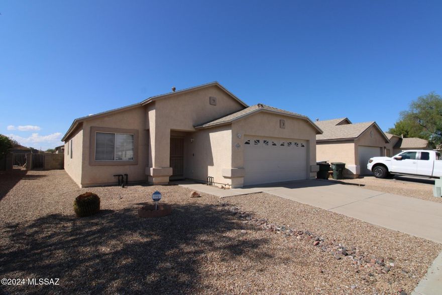 1,511 SQ FT! 3 bedroom, 2 bath home in Tucson's Wilmot Vista! Desirable single story floor plan with welcoming great room entry. Charming eat-in kitchen with included appliances! Open concept living/dining with sliding door patio access. Great entertainment space! Additional great room living. Neutral interior with wood-like flooring throughout. This home offers 3 nicely sized bedrooms! Primary suite with full bath. Blinds + ceiling fans! Laundry room with included washer/dryer. Enjoy a nicely landscaped backyard with covered patio & artificial turf! 2 car garage. Wilmot Vista is a well maintained community with playgrounds, & biking/walking trails throughout! Great Tucson location with easy I-10 access.

**Reduced rates available for longer lease terms.**