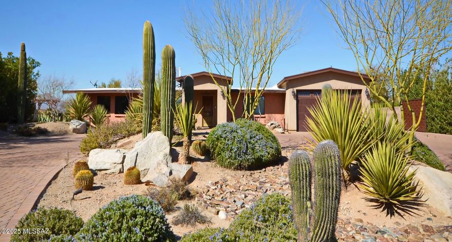 Sellers Will Accept Or Counter Offers Between $800,000-$840,000 - Luxury Living In Casas Adobes! This Home Has MANY Custom Features, That You're Sure To Enjoy. The Kitchen Is Amazing With Multiple Sinks, Premium Granite, And Tons of Space. The Fenced-In Backyard Was Built For Entertaining With A Pool, Deck, Grill, Bar, Firepit, And Playscape/Putting-Green Area. There's A 2nd Primary Suite With Separate Entrance, RV Parking, And A 4-Car Garage/Workshop (On Top Of The 2-Car Garage In The Main House). NEW Tile, Carpet, Paint, And Surround-Sound System. Custom-Built Cabinets & Closets Throughout. There's So Much To Like About This Home & Right Outside Of It Are Gorgeous Panoramic Views Of The Mountains, Desert, And Sunset!