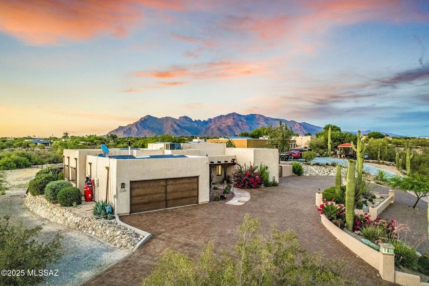 Discover your own piece of Tucson excellence with this stunning desert home. The interior features a striking exposed wood beam ceiling and architectural details that creates a warm, spacious atmosphere and adds natural character. This fully updated home is turn-key and features a resort style backyard complete with a beautiful pool, spa, multi-level deck, outdoor bathroom, and covered gazebo. A sprawling acre-plus of Sonoran Desert horse property, complete with essential animal facilities and ample space for an arena (with room for future expansion). Last but not least, the stunning backdrop to this amazing home is the Catalina Mountains, a dominant highlight of the Tucson landscape. This is more than a home; it's a lifestyle opportunity that is few and far between.