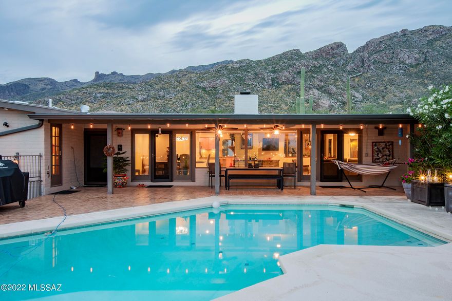 Incredibly SPECIAL Foothills setting adjacent to an 11-acre nature preserve on a perfect cul-de-sac! Wow, this super cute house is such a rare gem! Amazingly private w/ STUNNING VIEWS in all directions! Lovely front courtyard! Kitchen has wonderful, open feel w/ breakfast bar, granite tile counters, double ovens & stainless appliances. Primary bedroom has cozy bay window. Charming in every way! 4th bdrm is located off patio & makes a great office or guest space w/ tons of AMAZING room for potential guest house expansion. SIMPLY SPECTACULAR, MOST IDEAL FOOTHILLS LOCATION w/ perfect north/south orientation & NO STEPS. Some upgrades include: newer lighting, ceiling fans, security screens, water softener/reverse osmosis. Enjoy the serenity of the pool & very UNIQUE setting! Close to EVERYTHING