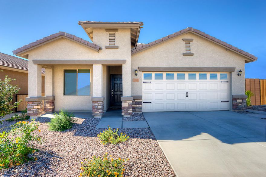 This beautiful new home comes with over $10,000 in upgrades including energy efficient stainless steel kitchen appliances, spacious granite countertops, custom wood cabinets, brushed nickel hardware and an attached two car garage. The Bisbee floor plan also showcases a master suite complete with a walk-in closet, as well as a separate dining room, a fully fenced backyard, covered patio and front yard landscaping. The San Lucas community offers a plethora of amenities including a community park, with basketball courts, sand volleyball courts and a baseball field. The amenity-rich community and new, hassle-free home provide an extraordinary lifestyle for you and your family.  Picture is of a similar home.