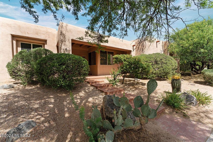 Prime Catalina Foothills location~tucked in at the end of a quiet cul-de-sac at the foot of the Catalinas. You'll be happy to find this first time on the market custom 4 bedroom home~featuring Saltillo flooring, beams, 2 fireplaces, tile accents and french doors. Bay window dining nook adds to the large open island kitchen over looking the family room.  Primary bedroom w/beehive fireplace, primary bathroom w/dual vanities, soaking tub, separate shower and generous walk-in closet. Expansive serene backyard w/covered brick paver patio, pool and spa surrounded by mature vegetation giving you the utmost privacy. Home is in need of updating, or would be good with some TLC~surrounded by more expensive homes. Minutes from Sabino Canyon, hiking trails, golf, shopping, and restaurants.
