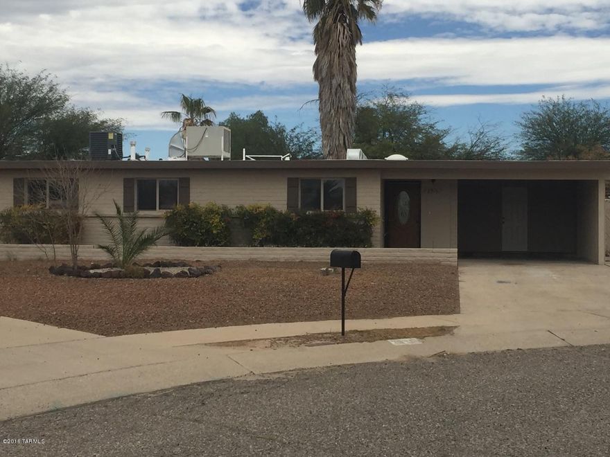 Fantastic 4 bedroom slump block home  waiting just for you! Beautiful new ceramic tile and new carpet and padding in all bedrooms.  You will love the amazing kitchen with new cabinets, granite countertops and stainless steel appliances. Upscale bathrooms with all new tile, lighting, and fixtures. Huge backyard with covered patio  and great swimming pool. Do not miss an opportunity to own this incredible home, come see it today!!!