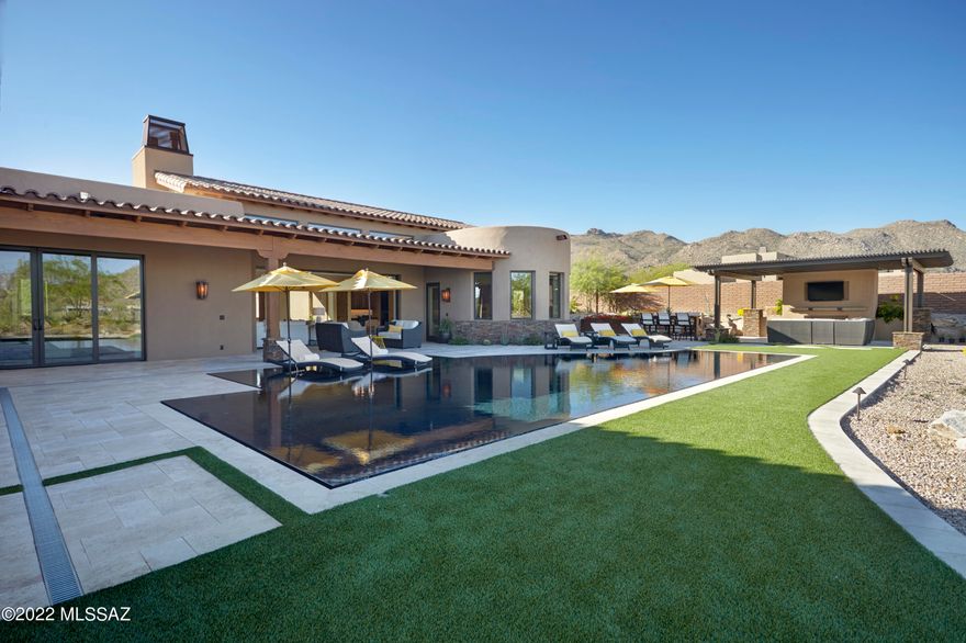 Incredible views are everywhere you look in this beautiful Custom Ritz Carlton Residence.  The main home has three large bedrooms and an oversized den.  The backyard has a 360 degree spillover pool and large casita that your guests will never want to leave. Come enjoy the Ritz Carlton lifestyle.