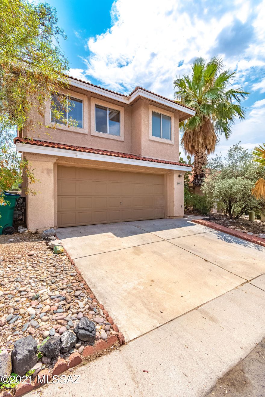 Spacious 5 bedroom home with a bedroom downstairs and 3 bathrooms. Two baths up and one bath down.  Mature landscaping with a full length back patio.Formal dining, living, family room off kitchen with breakfast area. Great location and lots of shopping and close to schools and I-10. Community pool. HOA pays for pool and common area, roads.