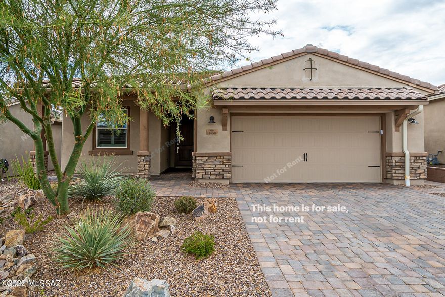 Don't miss this beautiful 2 bedroom 2 bathroom stunner in Marana! Enjoy preparing meals in this fully equipped kitchen with stainless steel appliances and a stylish updated backsplash. A soft neutral color palate ties the interior of the home together. The master bedroom boasts an en suite bathroom with double sinks and a spacious shower. Step outside to the backyard and find pristine desert landscaping and a patio area perfect for entertaining. Hurry, this won't last for long!