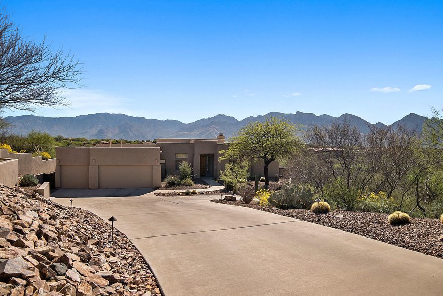 VIEWS THAT GO ON FOR MILES! Stunning custom built home with 4 bed/3bath + den. This home is an entertainer's dream, with breathtaking mountain views and a bright open floor plan. The kitchen is perfectly situated to take in the amazing views from the oversized windows. Large breakfast bar, beautiful custom cabinets, tons of counter space, matching built in appliances and access to the formal dining room. Lots of fun architectural cut outs and small details, a sweeping entryway and a floor to ceiling tiled fire place. This home truly has charm and character all rolled into one.  All of the bedrooms are spacious and feature picturesque windows, large closets, & soft plush carpet. The oversized 3 car garage features built in cabinets & work space.  The back yard has a large wrap around covered patio with outdoor ceiling fans, beautiful lighting and sparkling spa.