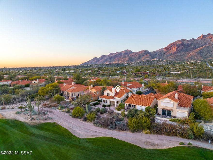 Masterfully crafted elegance and luxury is what you will find in this contemporary two story home located in the coveted La Paloma Vista neighborhood. The primary suite overlooks the golf course, and has spectacular unobstructed city and mountain views where you can relax on your private terrace and watch the beautiful Arizona sunset. The North bedroom also has breathtaking mountain views. The owners have spared no expense in this FULLY UPGRADED home from putting in a brand new roof, to fully removing and replacing the polybutylene pipes (so new they're still shiny) to installing beautiful new flooring and windows, stone fireplace, brand new kitchen including first rate appliances, brand new bathroom remodel and on and on. They have done all the work! It's move in ready!