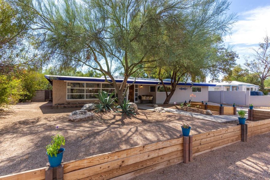 This Beautiful newly Remodeled Bathrooms and Kitchen.  New A/C unit. New Water Heater. Newcarpet. New sliding door in family room. New exterior and interior paint. New upgraded electrical box.   Kitchen is upgraded with Granite Counters, Stainless Steel Appliances, Farmers sink and Custom Walnut Cabinets. Hall bathroom has new marble vanity, new bath tub and toilet. Step into the Spa like Master Bathroom with a soaking tub, tiled shower and new marble vanities.  New Barn doors through out home. Office/Den off of Master Bedroom. Park like setting in backyard with Solar heated pool.  Grass and lots of trees. Large Freestanding Barn with Loft. Excellent Location in the Historical Poets Corner area. HURRY to see this wonderful home!