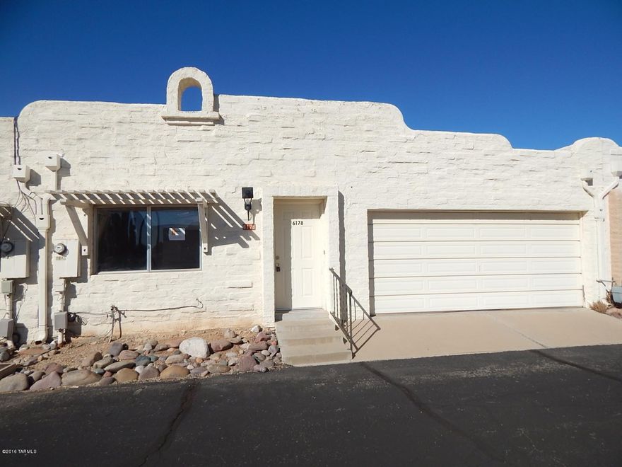 PRICE JUST REDUCED! This is a Fannie Mae HomePath property. With 1127 sq ft of living space this town home has 2 bedrooms, 2 bathrooms, & 2 car garage. Located in Sierra Villas North subdivision, a gated active adult community in Southwest Tucson with community pool and spa, near shopping, restaurants, and much more! <FONT COLOR=RED> Recently painted interior with two tone paint,  installed NEW Carpet, New microwave, NEW Oven/Stove, & NEW Dishwasher.</FONT> Attention First Time Buyers: complete the HomePath Ready Buyer homeownership course. Attach certificate to offer and request up to 3% closing cost assistance. Ask Agent for more details. Restrictions apply.