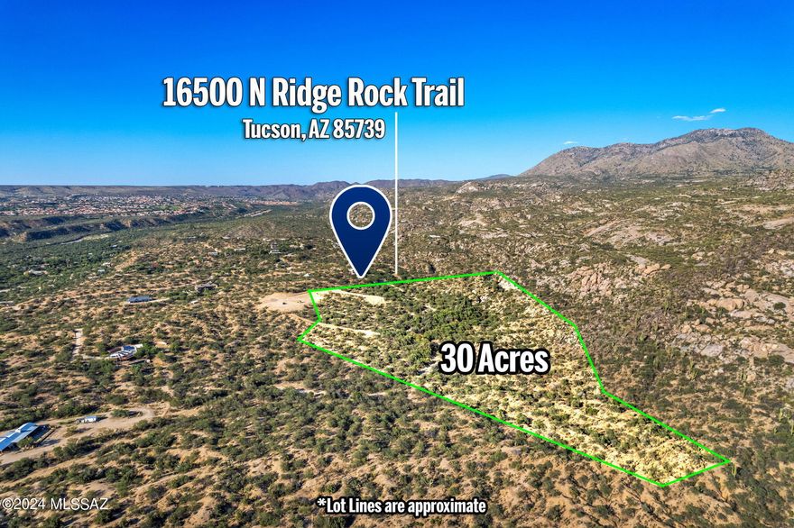 Nestled amidst the breathtaking backdrop of the majestic Santa Catalina Mountains, this sprawling 30-acre property offers unparalleled beauty and endless possibilities. A custom home has already been designed and permitted. All excavation and site prep has been completed.  Nearly one acre of flat pad completed & ready for a new custom home, serene desert getaway, or eco-friendly sanctuary.  Minutes from Miraval Resort & Spa and Catalina State Park.  This is the slice of desert paradise you have been waiting for!