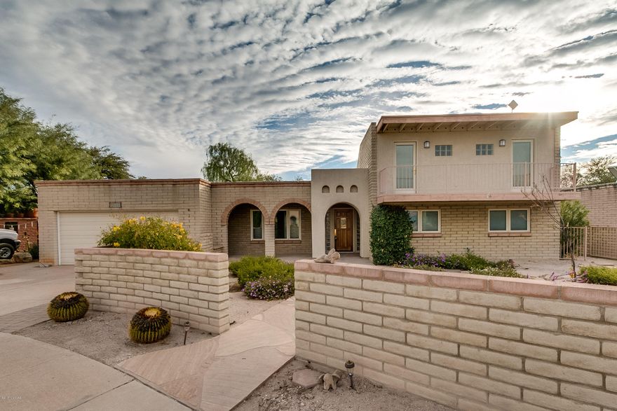 Yes! You can have it all! Cul-de-sac living, 5 BR/3 Baths, Pool, spectacular great rm floor-plan & captivating out dr living w/ MTN views & roof deck! Bonus-Pella drs & windows & updated kitchen! 5th BR has own entrance-perfect for home office/mother-in-law ste/game rm/! 3 guest/children rms. 2 of them have bonus loft/study area & balcony (Only steps in house)! Stunning lg kitchen,opens to Gr Rm, w/ granite, double built-in refrigerator & high end appl. incl. double ovens! Multiple areas to entertain! Fire-pit area near pool, lg cov. patio, fenced pool, roof deck featuring dramatic sunset & Mtn views. Formal living & dining too! All w/buffer behind east facing rear yd! 2 car gar w/work bench. Discover this extraordinary rare property in E/NE neighborhood near schools,restaurants & parks!