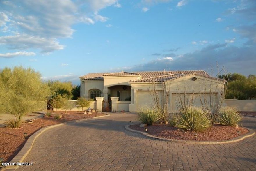 Priced to sell! below July appraisal of 525,000. Professionally landscaped .86 Acre, Host Your Next Pool Party In This Backyard Oasis, Pool & Spa With Solar Or Gas Heat. Pebble Tech. 8' Deep With In Floor Cleaners And Waterfall. Catalina Mountain Views, Impressive Front Entry, Courtyard With Custom Copper Gate. Chefs Kitchen With 6 Burner Comm. Grade Stove, Double Ovens, Granite Counter tops, Center Island With Prep. Sink, All S.S. Appliances, Cherry Cabinets. Open Floor Plan With 20'' Porcelain Tile And Plantation Shutters Throughout The Home. Split Bedroom Plan. Relaxing Master Retreat With Access To Backyard, Separate Executive Height Vanities, Spacious Custom Shower & Garden Tub. Oversize Laundry Room. Formal Dining With Tray Ceiling. Zoned HVAC Just Serviced, 2 Year roof Warranty.