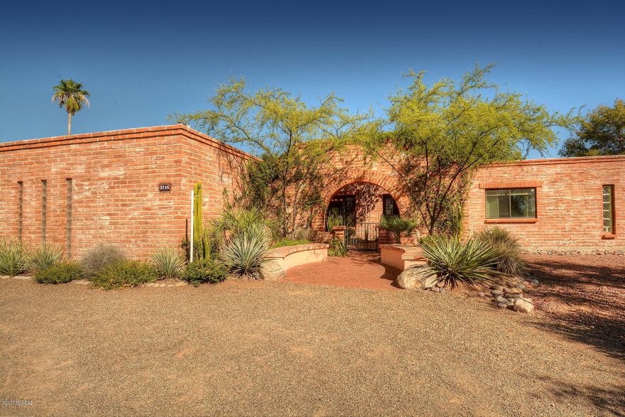 Wonderful masonry home on a great private lot in the lower Foothills near Sabino Canyon, boasts a beautiful backyard oasis, great floor plan including a well appointed open kitchen, gracious fireplace, Den/Library or could be an additional bedroom, central vac, abundant storage, terrific mountain views and excellent outdoor entertaining spaces, including a sparkling pool & spa, covered patios, & a separate shady ramada from which to enjoy the mountain views!
