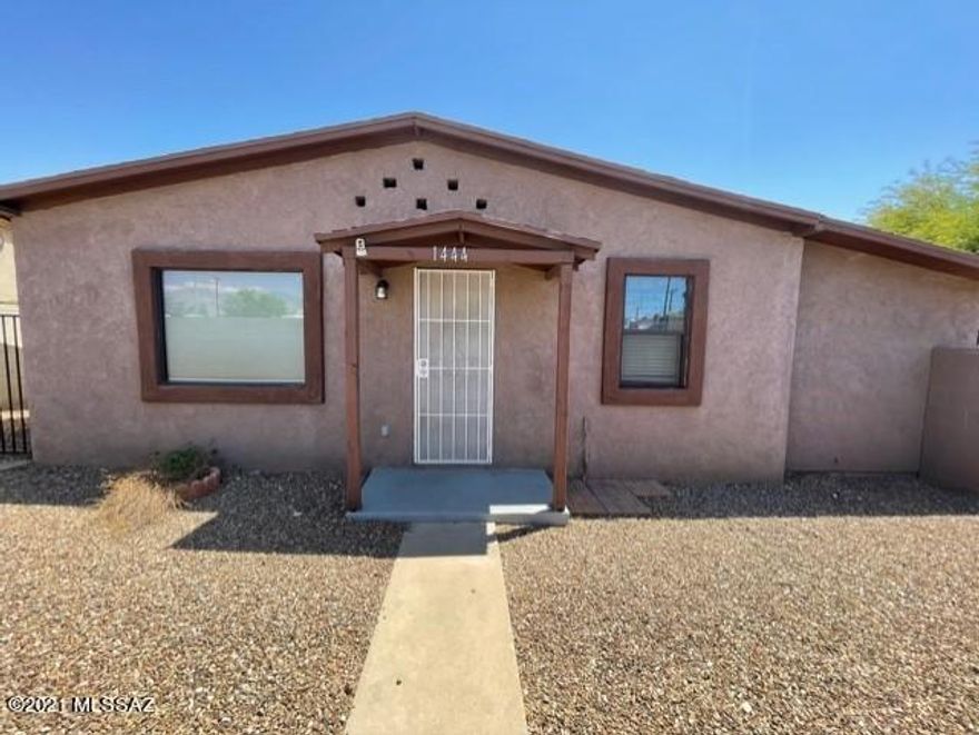 This amazing, completely updated, including electrical, plumbing and windows, bungalow style home is located in central Tucson in the historic district close to U of A and Banner Hospital. The most recent updates were adding a master bathroom, back patio and a detached two car garage and covered parking. Because of the large .19 acre lot and NO HOA, there is room to park a 22ft RV next to the garage! There are so many upgrades in this home you have to see it to believe it! Don't wait, it won't last!