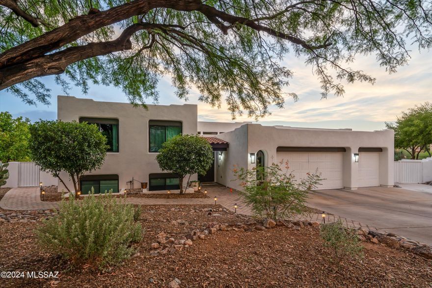 STUNNINGLY UPDATED HOME IN THE HEART OF OV! Room to roam in all the right places! With 5 bdrms, 4 bths, + den/office, +  game/bonus room downstairs, this tri-level property is a rare find. Wide-open kitchen features 2 ovens, 2 dishwashers, gas range with pot filler and ample counter spaces with breakfast bar. The kitchen seamlessly opens to one of the home's three living spaces. This unique layout includes 3 bdrms upstairs and 2 downstairs. Home features updated bathrooms, windows and light fixtures which adds fresh, contemporary feel to the home. The outdoor space will knock your flip-flops off!! Sparkling pool w/slide, in-ground trampoline and outdoor fireplace. Enjoy the huge deck for viewing our gorgeous AZ sunsets. List of amenities goes on...come see for yourself!