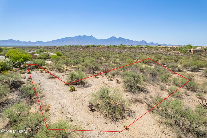 Build your dream home on one of the best home lots in Madera Reserve, a peaceful, established community known for its natural desert beauty and custom homes. As you enter the lot, you'll be amazed by the stunning views of the Santa Rita Mountains and ample space and flexibility to design the perfect desert retreat. Surrounded by preserved open space and mature desert vegetation, enjoy the privacy and tranquility that sets Madera Reserve apart. Utilities are to the lot line and the sewer line is in the building envelope. The layout of this lot makes it ideal for building with minimal site prep. Whether you're looking for a seasonal escape or a full-time residence, this homesite offers the perfect canvas for southwest living.