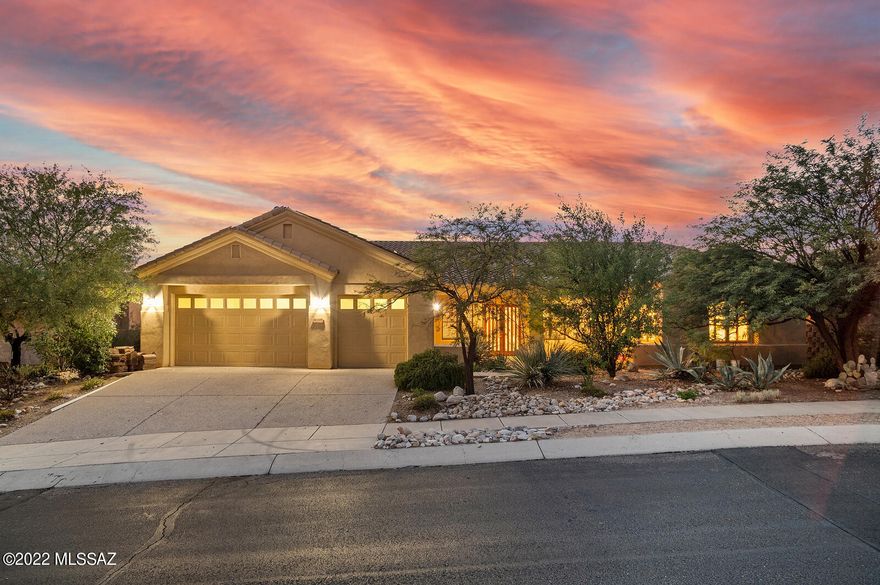 Located in the desirable gated community of Fairfield River Estates in the Catalina Foothills with gorgeous mountain and city views! Features include split floor plan, a formal dining/living room area, a great room w/ a cozy fireplace, high ceilings, decorative tile flooring at the entrance, and ceiling fans galore. Island kitchen has an abundance of granite and cabinetry, double oven, gas cooktop, and large pantry. The Owner's Suite features convenient access to patio, mountain, city and sunset views, a large walk-in closet, jetted garden tub, walk-in shower, twin sink plus vanity. Spacious en suite 2nd master has a private den w/ built-in shelves. Conveniently located near shopping, restaurants, schools & the river walk. Don't miss this Foothills Gem!