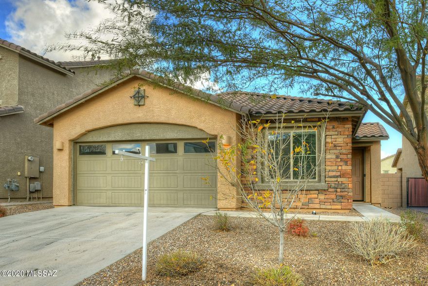 If you thought you may have missed the chance to buy a new Lennar home in Mountain Vail Estates, here is the next best thing - move in ready and full of upgrades, this 4 bedroom shows just like new - very lightly lived in with fresh interior paint throughout. Gourmet kitchen w/ granite counter tops, stainless appliances (new dishwasher) and maple cabinets. Wood pattern luxury plank tile throughout with quiet carpet in bedrooms. Split plan has private master suite w/ huge master shower and executive height countertop. Open concept great room. An upgraded front elevation featuring stacked stone welcomes you home. Back yard is just like a new house ready for your vision!