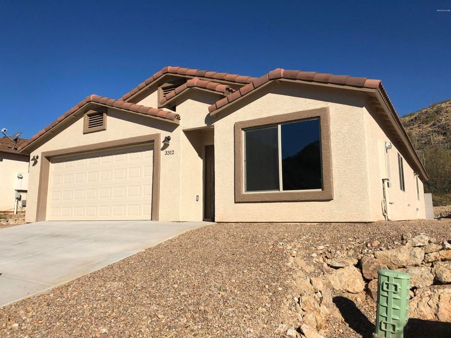 Beautiful NEW construction home, far away from the city but still minutes away from shopping center and Downtown Tucson! GREAT Location, nestled in a saguaro studded mountains! Kitchen and bath have granite countertops. Master has walk in closet and beautiful mountain views. Also, home comes with 1-year home protection plan along with Home Warranty plan- buyers choice! This home is a must see