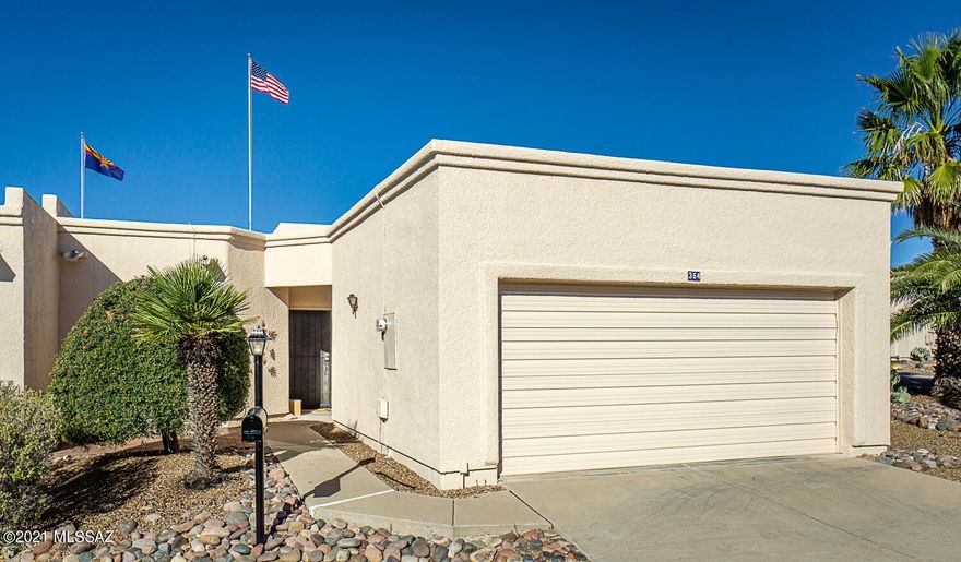 Spacious, light filled Green Valley Townhome with high ceiling, transom windows, plantation shutters throughout, and multiple skylights.  Arches add  elegance to the interior beauty of the home.  White kitchen cabinets and ceramic tile with kitchen eating area and large pantry. The Great Room features a wood burning fireplace and formal dining area   2 BR 2 Ba plus a large Den with skylight. Backyard covered patio wraps around back and side the home. Bryant HVAC installed  2014  Garage with storage cabinets, skylight and laundry area. The HOA paints the exterior of this home so that's worry free.  Outstanding location in Green Valley in walking distance to GVR pool, walking trails, and easy access to all shopping and restaurants
