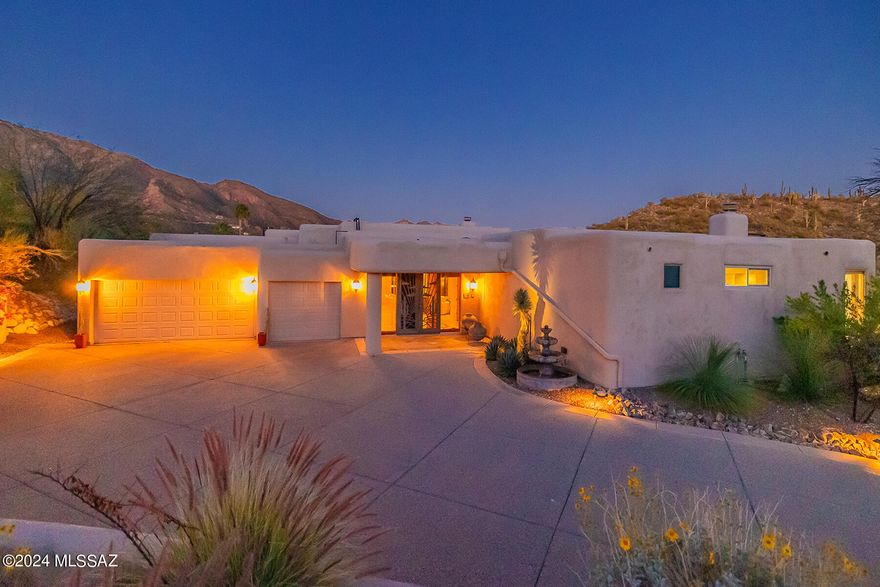 Experience breathtaking city and mountain panoramas from this exquisite 5-bedroom, 4-bathroom residence, nestled in the prestigious Alta Vista Estates. Spanning 4,382 square feet, this home marries elegance with functionality. Step inside to discover opulent 24 x 24 inch travertine flooring that seamlessly flows throughout the space, setting the stage for a symphony of luxurious living.

At the heart of this magnificent home lies a chef's kitchen, outfitted with top-of-the-line Viking and Dacor appliances complemented by stunning granite countertops—promising both culinary inspiration and sophistication. Seamless windows in the kitchen provide spectacular city and mountain views, enhancing every meal with their breathtaking surroundings. Adjacent to this culinary haven, find an off-kitchen dining area that fosters intimate family meals. Additionally, there is a large formal dining room for hosting grand dinners and a wet bar off the dining room with barstool seating, perfect for entertaining.

The grandeur extends to the primary suite, an expansive haven designed with a see-through fireplace to the primary bath. Spacious primary bath includes a jetted tub, separate shower, dual vanity, and oversized walk-in closet, establishing a sanctuary of relaxation and luxury.

This home's architectural genius is further emphasized by its split floor plan, ensuring privacy and comfort, with high ceilings throughout that elevate the sense of space. Positioned on a cul-de-sac lot, it guarantees an added level of peace and privacy.

Outside, a private backyard oasis awaits, complete with a sophisticated built-in BBQ and cozy fireplace, creating the perfect backdrop for entertaining or tranquil relaxation. The presence of a fountain in the front yard invites guests into the home, offering a serene welcome. Immerse yourself in the serenity of the sparkling pool and spa, where the stunning views of the city and mountains unfold before your eyes.