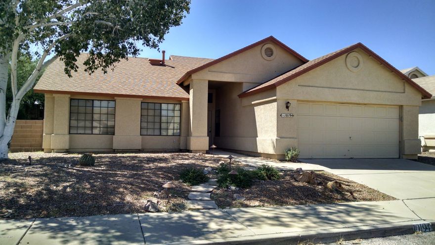 Beautiful eastside home. Vaulted ceilings with a stone fireplace in living room. The kitchen has great granite counter tops with stainless steal appliances. Lots of storage space. Beautiful hard wood floors running through most of the house also with tile and carpet. Large master bath with walk in closet. Duel cooling AC/Evap. Large pebble Tec pool. Nice covered patio and built in outdoor grill. This home is a must see.