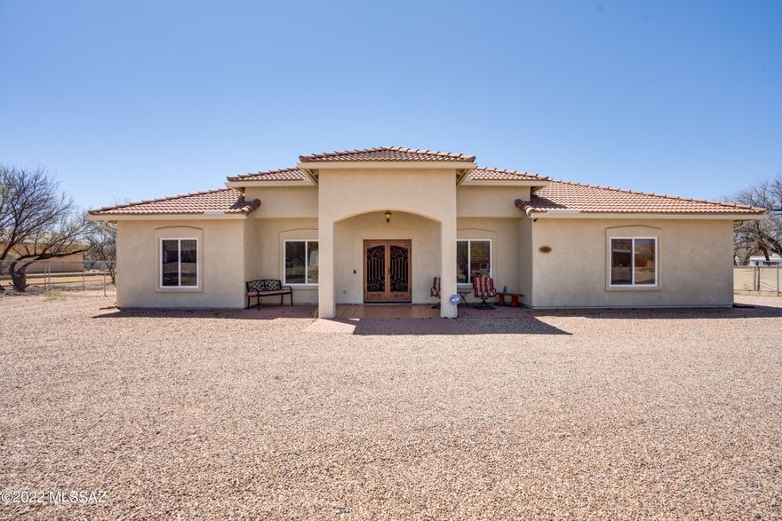 Room for everyone in this beautiful 5 bedroom/3 bath horse property home located on a quiet cul-de-sac in St. David. Large, open kitchen with new stainless steel appliances and a cozy breakfast nook. The separate dining area is the perfect spot for family dinners and holiday gatherings. Enjoy the 9' ceilings, recessed lighting, and ceiling fans in every room. The master bedroom boasts a large walk-in closet and a spacious en-suite with dual sinks, a separate vanity area, large garden tub, and separate shower. In addition, two full sized guest baths each offer a shower/tub combo and linen closets. The screened in porch affords extra living space and a magnificent view of the tree-filled back yard which is just shy of an acre. This beautiful home also offers a central vacuum system.. recirculating hot water system, whole home surge protector and transfer switch with natural gas hookup installed for a backup generator. There is plenty of space for your cars and storage with a two-car attached garage and a 12'x16' shed with built-in shelves. The entire property is enclosed by a 6' chain link fence and includes an adorable playset. Everything you've been looking for in a peaceful, inviting location with stunning mountain views!