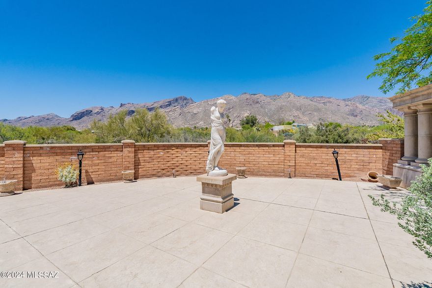 Step into your new home, located in the beautiful Skyline Bel Air Estates, this 4 bedroom 3 bath home offers the perfect blend of luxury living and breathtaking natural surroundings.
High ceilings and plenty of natural light fill this property! The versatile loft area, with a gorgeous wood, spiral staircase, is ideal for a home office, creative space or an additional living space and offers a beautiful mountain view. Entertain guests or simply relax and unwind in the large courtyard featuring a charming gazebo. .  There is ample outdoor space to enjoy year-round and to soak in the spectacular views of the Catalina Mountains. The heart of the home is the updated kitchen with updated appliances and stylish finishes. Cozy up by the fireplace in the living room. The property location offers not only stunning mountain views, but also convenient access to a variety of amenities including shopping, dining and recreation activities. Don't miss your chance to own a home where luxury meets nature! Schedule your tour today and get ready to discover your future home!