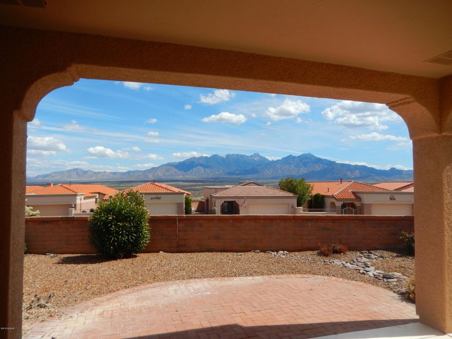 Fantastic mtn. views from the private back patio. 2 Bedroom suites plus living room and family room or den. Very well maintained - HVAC replaced 2017, roof coated 2016 with warranty, and refrigerator 2 years old. Outside and inside living areas painted 3/2019. Most windows replaced. New granite counter tops installed 4/2019. Extra large 2-car garage with room for golf cart.