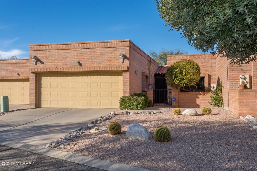 Walk into this beautifully upgraded townhouse & feel like you are home in Fairfield La Cholla Hills, 55+ Active Adult Community! Remodeled in 2016 w/taupe paint throughout & beige gold carpet in bdrms/greatrm. Many custom features to enjoy! Granite countertop & refaced cabinets in kitchen, remote controlled ceiling fans, skylights, windows have valances/wooden blinds. Patio offers custom pavers, motorized awning w/remote control for privacy. Wired for security inside, cameras w/monitor outside. The community offers many amenities that include 2 heated swimming pools, tennis courts, pickleball courts, clubhouse/Rec Center with kitchenette. Monthly newsletter w/upcoming events & clubs to join. Near shopping, hospital, restaurants golf/walking/biking trails, too!