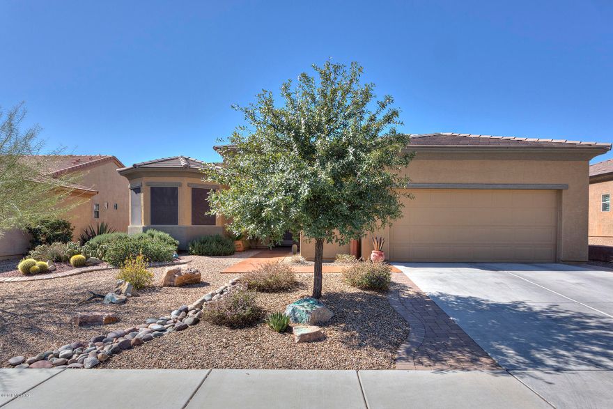 Wonderful home in the desirable San Miguel neighborhood of Las Campanas. Open concept San Dimas model is perfect for entertaining. This home features 2 bedrooms, 2 bathrooms, a spacious den and a separate office with built-in desk and cabinets. Cozy beehive fireplace in the great room. Kitchen features Corian counter tops, a tiled back splash, under cabinet and above cabinet lighting and bottom cabinet pull-outs. New Kenmore gas range and microwave installed in 2017.  Large covered patio is a great place to relax with a cup of coffee. Extended 2-1/2 car garage with overhead storage, a work bench and cabinets. Custom paint, custom lighting and ceiling fans throughout. Master bedroom has cellular blind window coverings. Put this one on the top of your list!! You'll love it!