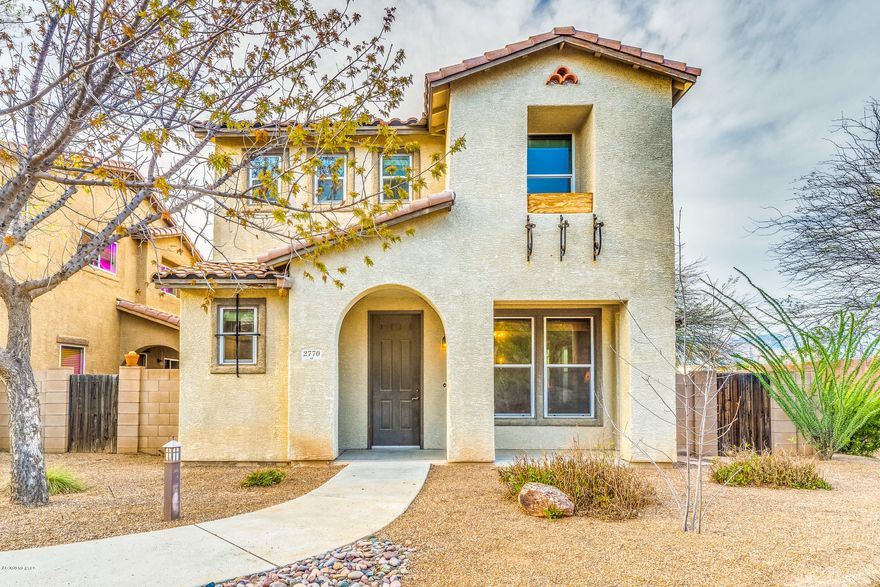 Check Out This Amazing Two Story with Loft in Central Tucson that offers Stellar Mountain Views! This ideal floor plan allows for efficient use of space. Downstairs Great Room flows easily between Family Room, Kitchen and Dining Area, and also features Powder Room. Functional Kitchen with Upgraded Cabinetry and Breakfast Bar. Tile throughout first level. Upstairs you'll find a generous Master Bedroom En Suite, Spacious Loft Area, Two Additional Bedrooms and a Full Guest Bathroom. Two car garage plus additional parking = BONUS! You need to SEE IT to BELIEVE IT! Priced to SELL!!!