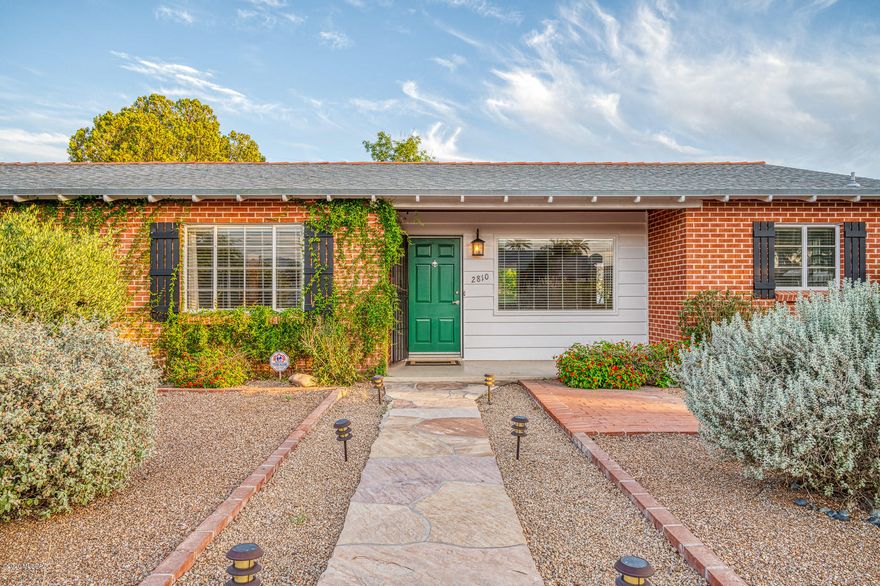 Charming updated brick bungalow home in desirable Broadmoor neighborhood just south of Broadway between Tucson blvd and Country Club Road. Minutes from University of Arizona and Banner Medical Center. Indoors, enjoy open living space connected to dining area, tastefully renovated kitchen with granite counter tops, stainless steel appliances, & of plenty of pantry/ cabinet storage. Delight in a private outdoor space, covered patio, flagstone walkways and manicured landscape. Have the luxury of your own 200+ sq ft detached workshop/studio in addition to a secured storage shed.