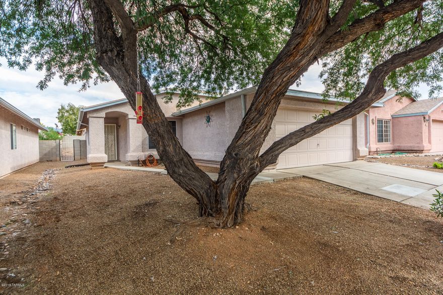 Come see and buy this move in ready,3 bd/ 2ba with newer kitchen appliances and state of the art washer and dryer that stay!! Garage has garden tools, shelving and work bench and is conveniently located near Pima CC East, DMAFB, Houghton Rd shopping, dining, I-10, Fred Enke Golf Course and more.  This is priced to sell and shows very well.Not a short sale or a foreclosure, just a great house at a great price!!