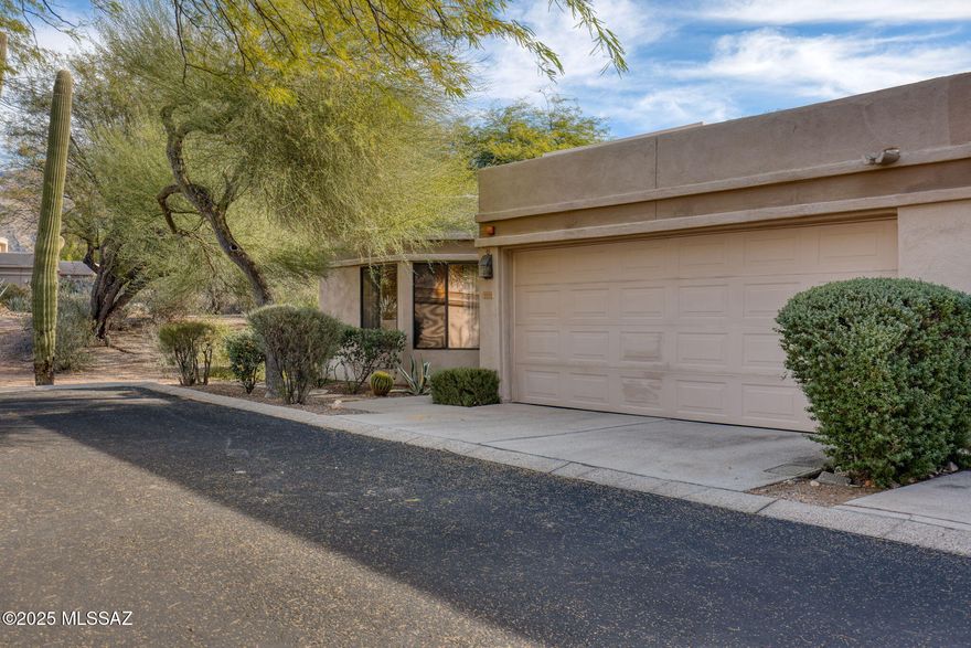 Beautiful Las Palomitas corner cul-de-sac home with mountain views. Bright interior features high ceilings, travertine flooring, and sliding doors opening to a wraparound patio. Spacious kitchen with stainless appliances and generous storage. Split floor plan with large primary suite, dual vanities, and walk-in closet. Office with Murphy bed can function as a 3rd bedroom. Custom garage storage, low-maintenance landscape, and gated community with pool and spa. All furniture available on separate bill of sale.